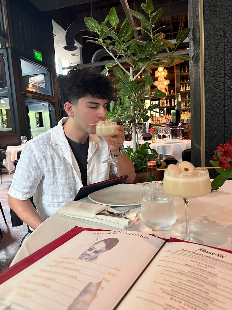 Seyhaun Bozorgi at a restaurant in Miami